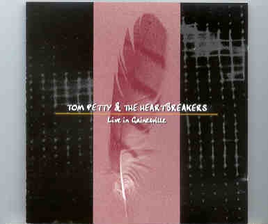 Tom Petty – Live In Gainesville ( Swingin’ Pig ) ( O’Connell Center , Gainesville , Florida , USA , 1993 ) front cover Tom Petty - Live In Gainesville ( Swingin' Pig ) ( O'Connell Center , Gainesville , Florida , USA , 1993 ) front cover