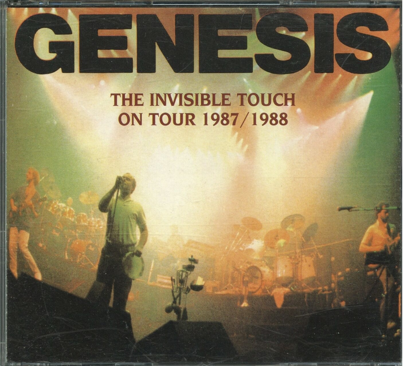 GENESIS – The Invisible Touch On Tour 1987/1988 ( 2 CD ) ( Live at Various Locations During The Invisible Touch World Tour ) front cover GENESIS - The Invisible Touch On Tour 1987/1988 ( 2 CD ) ( Live at Various Locations During The Invisible Touch World Tour ) front cover